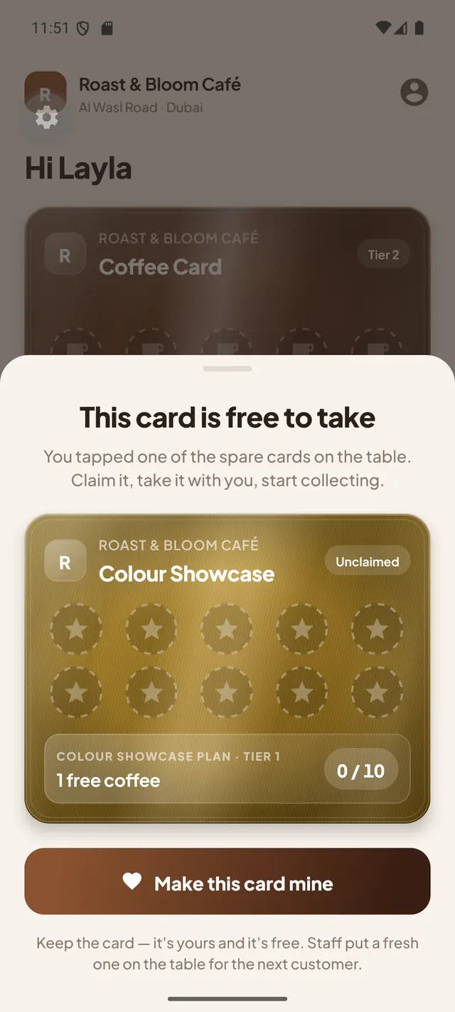 The claim screen on a customer's phone, reading This card is free to take, with a Make this card mine button